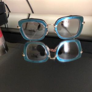 Miu Miu sunglasses teal blue stylish shades